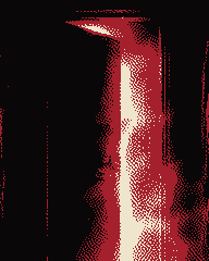 A door standing slightly open with red light behind it